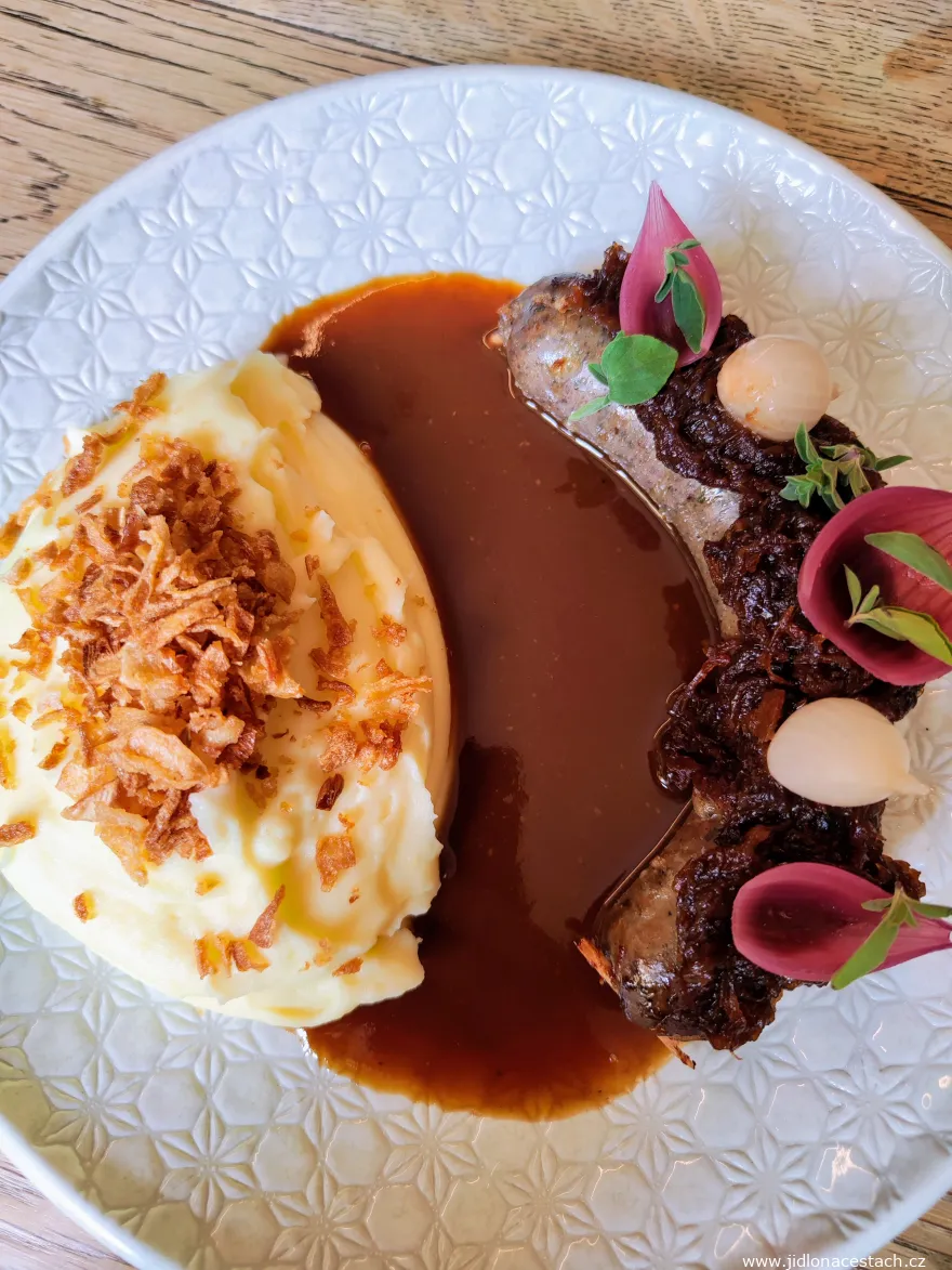 Lunch menu at Výčep Restaurant - jitrnice, our pork liver sausage, with mashed potatoes as the main course (June 2023). Lunch menu at Výčep Restaurant - jitrnice, our pork liver sausage, with mashed potatoes as the main course (June 2023).