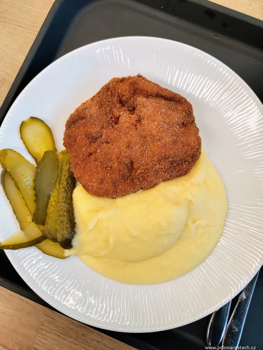 Lunch menu at Jídlovice Canteen in Karlín: ham-and-cheese-stuffed schnitzel with mashed potatoes and pickle (January 2025). Lunch menu at Jídlovice Canteen in Karlín: ham-and-cheese-stuffed schnitzel with mashed potatoes and pickle (January 2025).