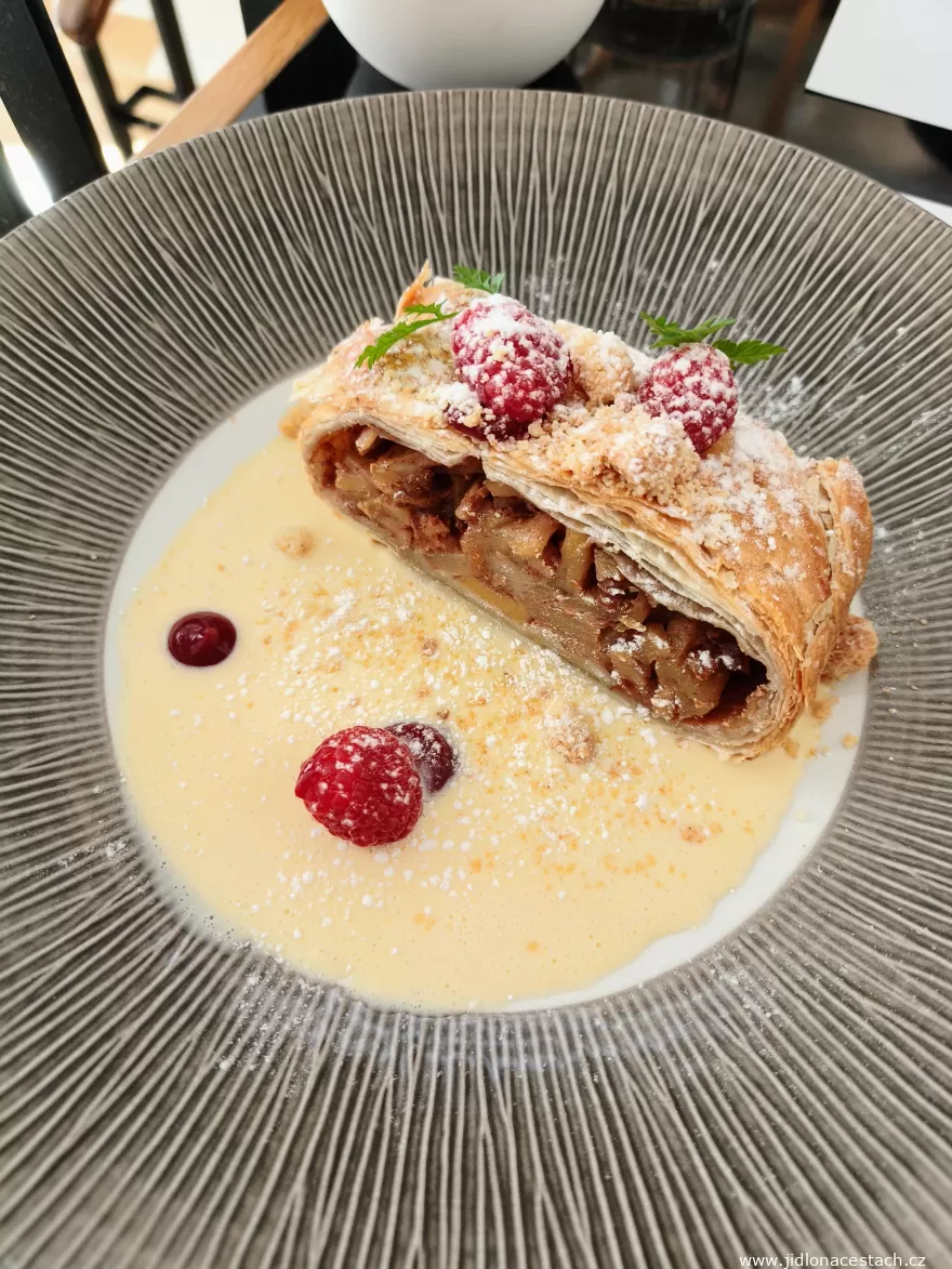 Lunch menu at Dejvická 34 Restaurant - apple strudel with walnuts, vanilla sauce and raspberries (October 2026). Lunch menu at Dejvická 34 Restaurant - apple strudel with walnuts, vanilla sauce and raspberries (October 2026).